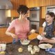 All The HVAC Advice You Need To Know To Save Money This Summer-Mother & daughter making cupcakes in the kitchen